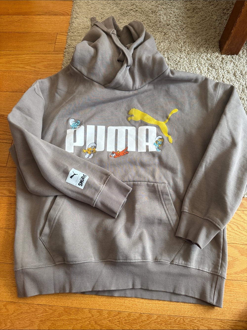 Puma Men's Taupe Hoodie with Yellow Logo and Smurf Character Accents